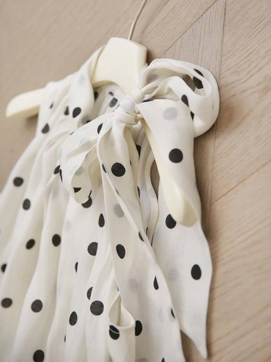 Polka dot tie neck loose fit flowy sleeveless blouse top
